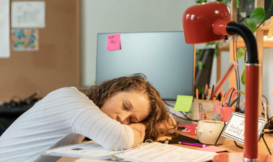 women fell asleep at her desk